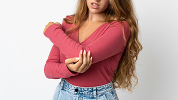 patient requiring elbow pain treatment in Santa Maria CA
